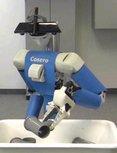 Robot Cosero picking a part from a transport box